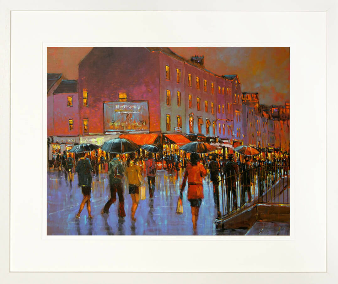 A framed print of a painting of Thomas Street in Limerick