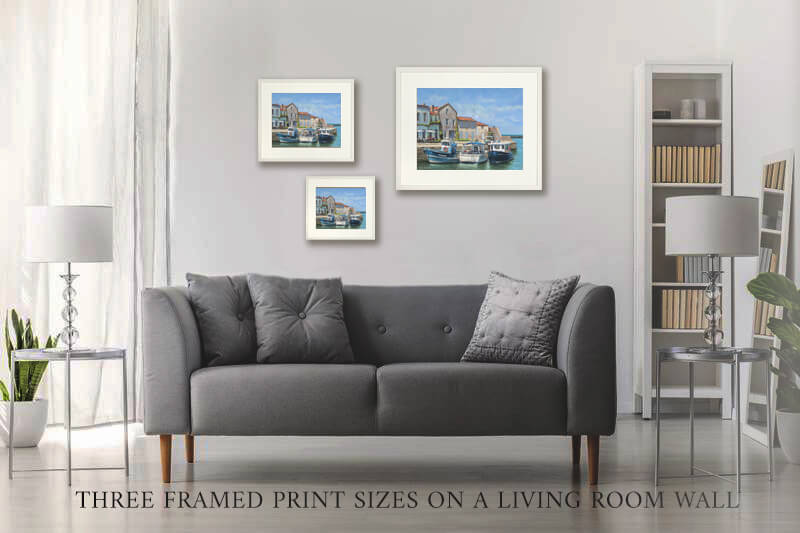 Photo of three versions of the quiet harbour print on a wall