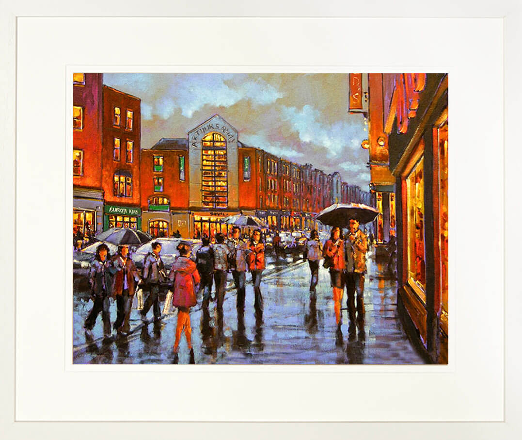 A framed print of a painting of a crowded Limerick street