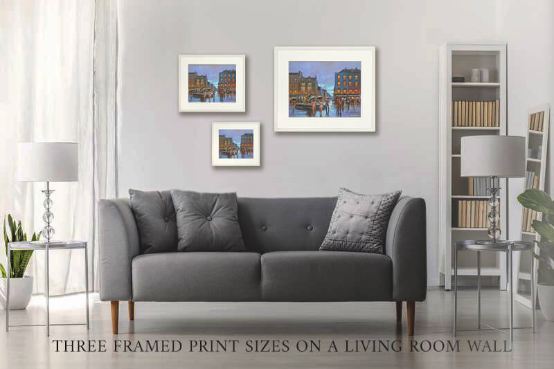 PHOTO OF THE THREE PRINT SIZES OF FRAMED PRINTS ON A LIVING ROOM WALL