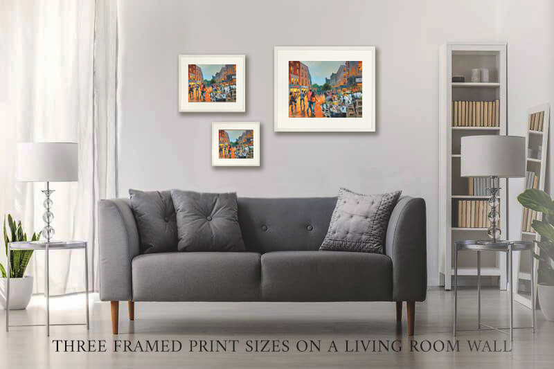 Three framed Grafton Street prints hanging on a wall