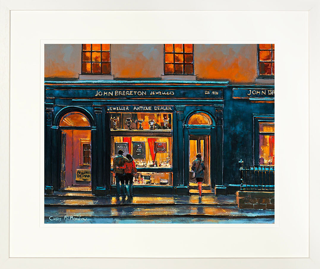 A framed print of a painting of a couple looking in a jewellers window in Capel Street, Dublin