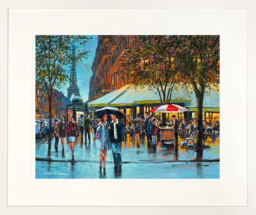 A framed print of a painting of a couple walking along a busy Parisien boulevard