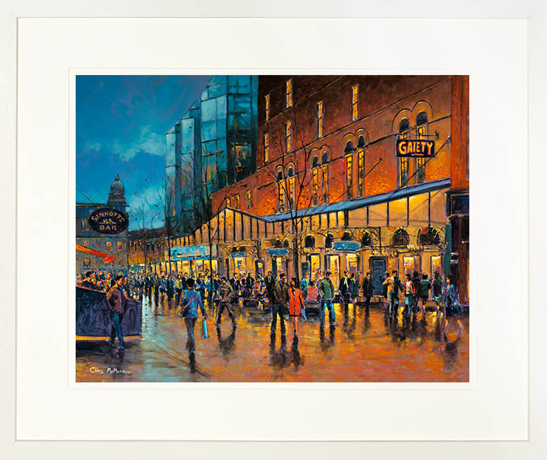 A framed print of a painting of a crowd of people outside the Gaiety Theatre on King Street, Dublin