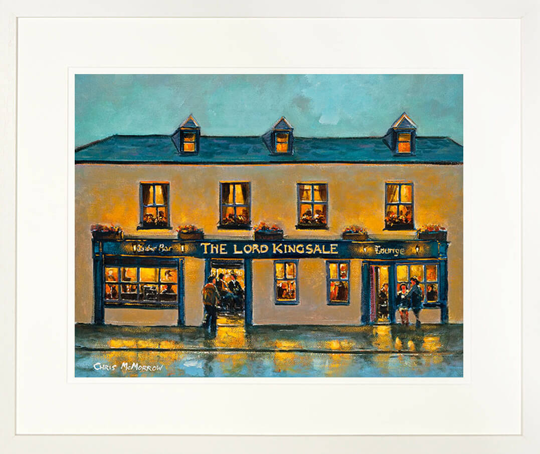A framed print of a painting of the Lord Kingsale Pub on the main street of Kinsale, Co Cork