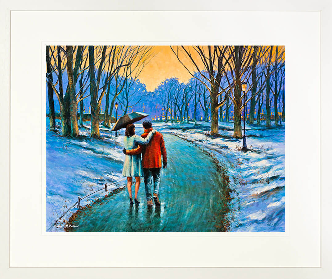 A framed print of a painting of two people walking under an umbrella in the snow in St Stephens Green, Dublin