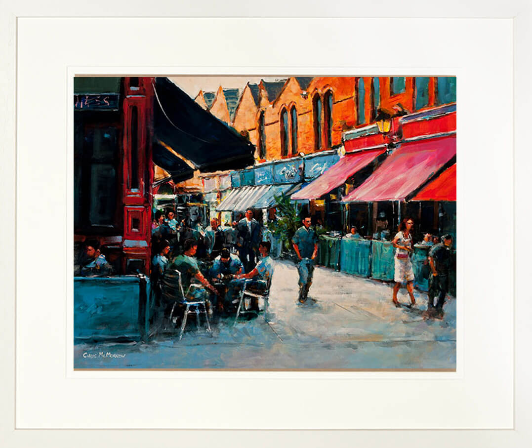 A framed print of a painting of a busy Castlemarket on a busy afternoon in the city centre, Dublin