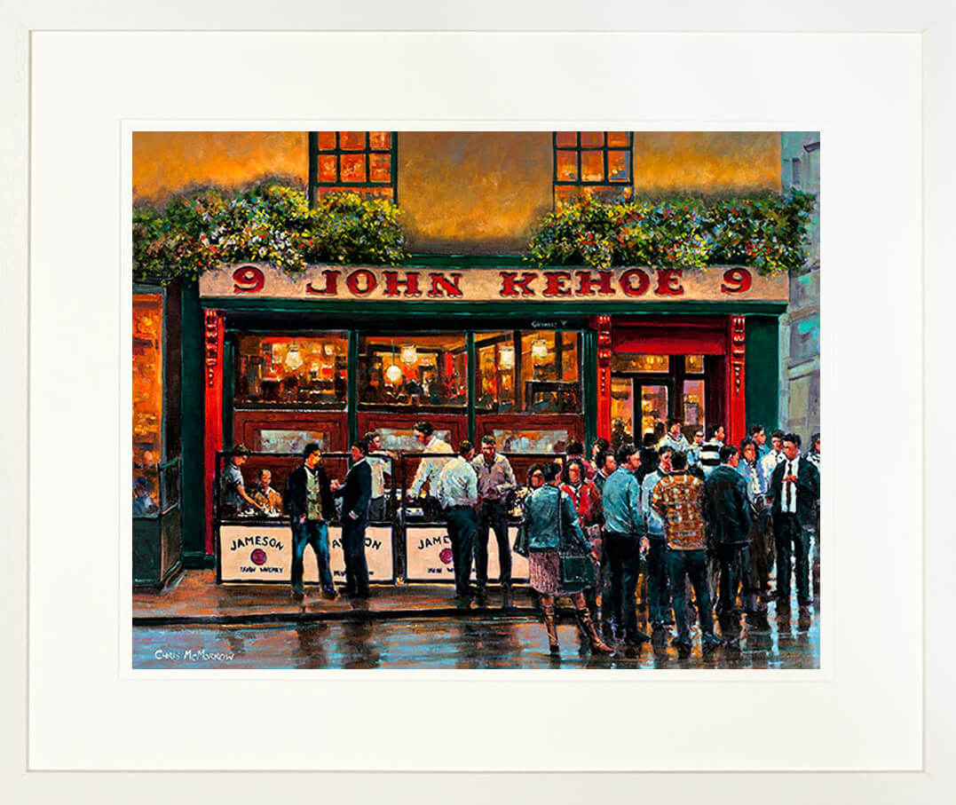 A framed print of a painting of people drinking outside Kehoes Pub in Dublin city centre