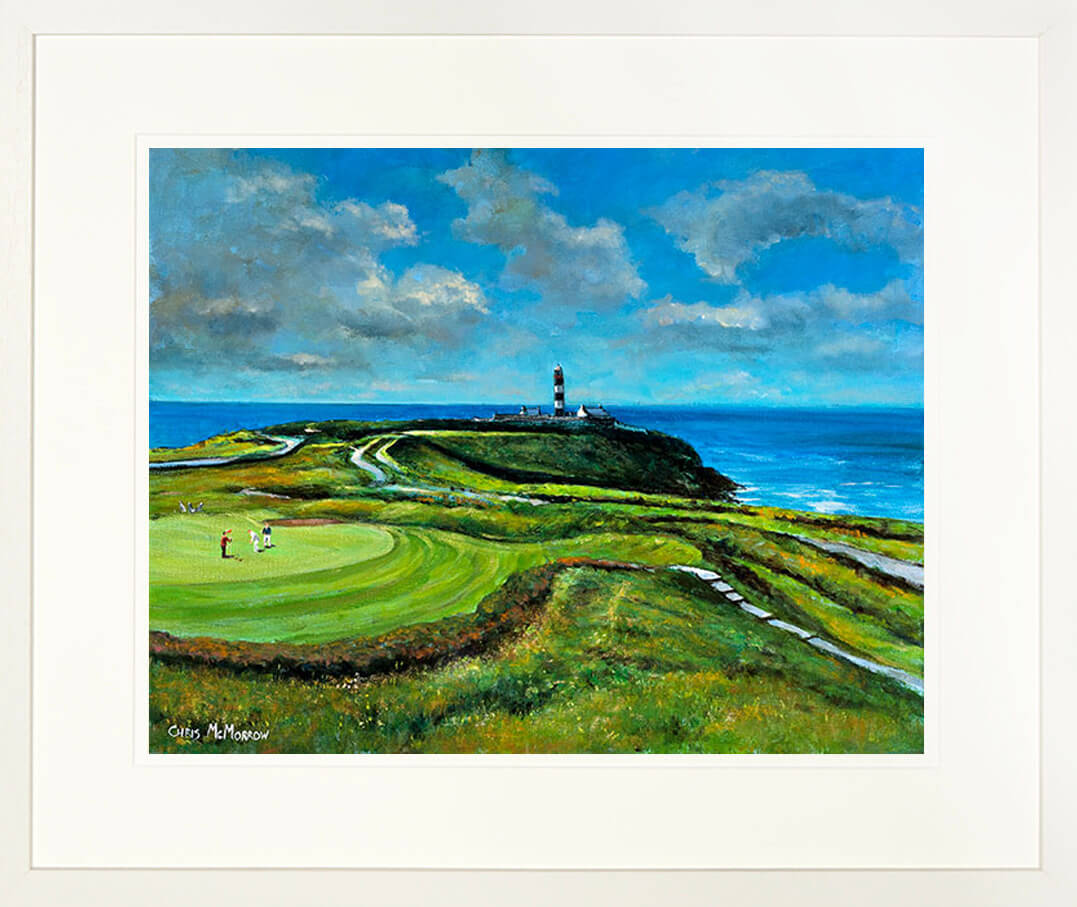 A print of a painting showing the golf links of the Old head of Kinsale Club mounted and framed