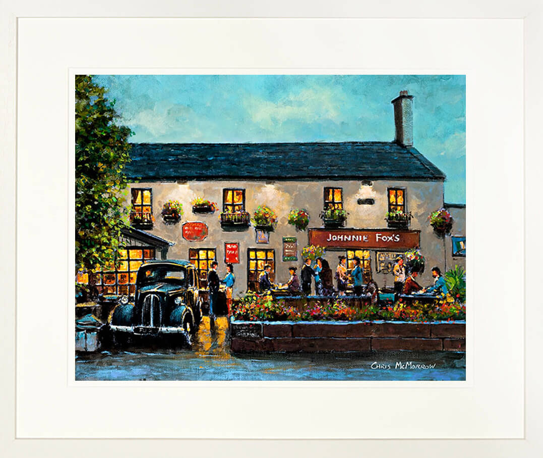 A print of a painting of Johnny Fox&#39;s pub nestled in the Dublin mountains mounted in a cream frame