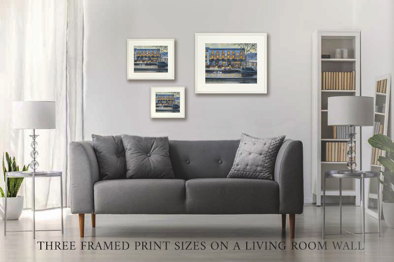 Three framed sizes of Lower Deck prints on a wall
