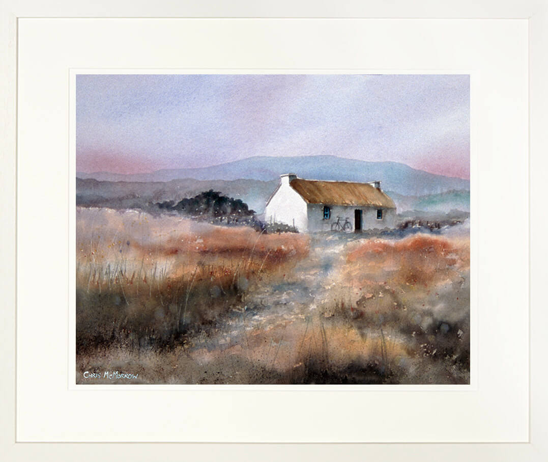 Framed print showing a traditional Irish thatched cottage