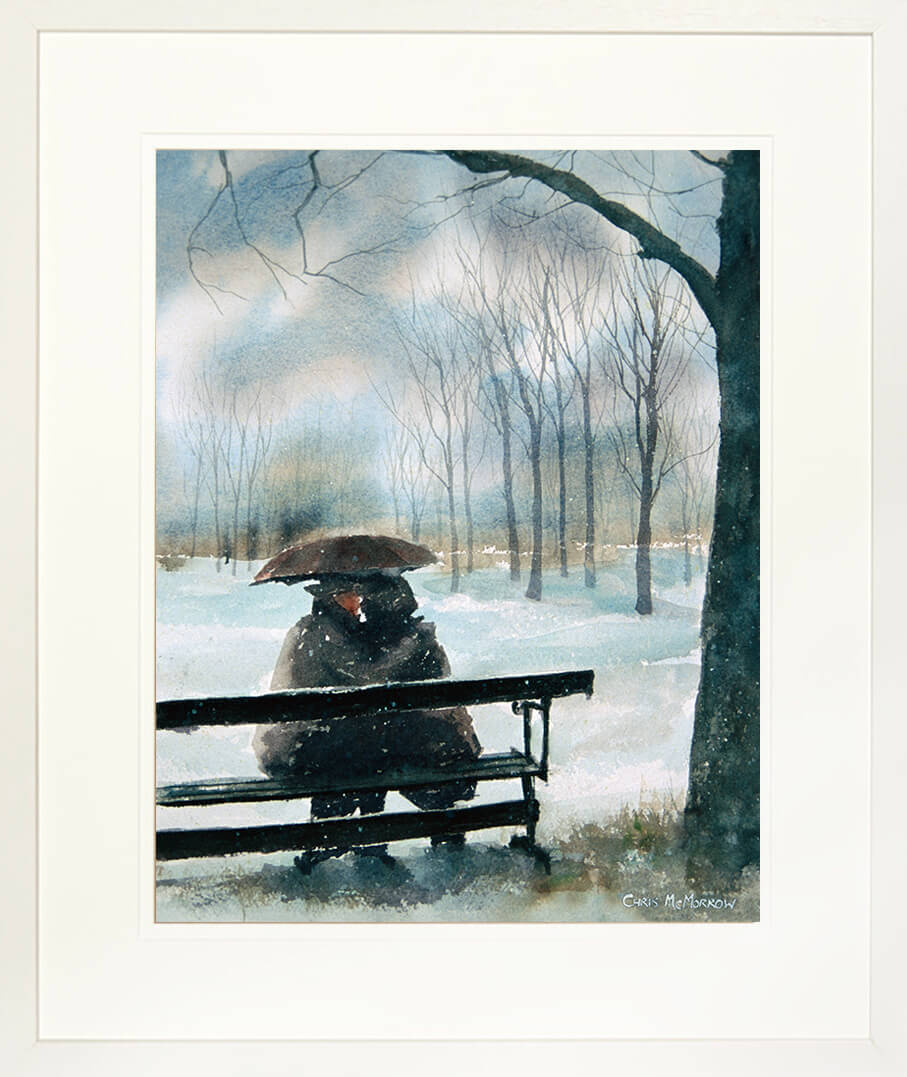 Framed print of a couple sheltering from the snow under an umbrella