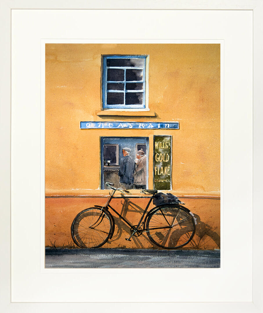 A high nellie bicycle rest against a wall as 2 men have a drink in a pub