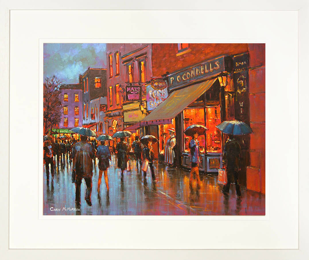 A framed print of a vibrant painting of people on Little Catherine Street in Limerick