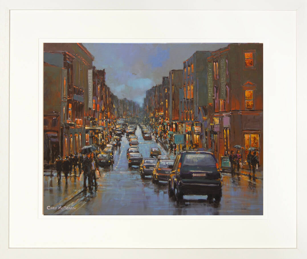 A framed print of a painting of people out and about on Sarsfield Street