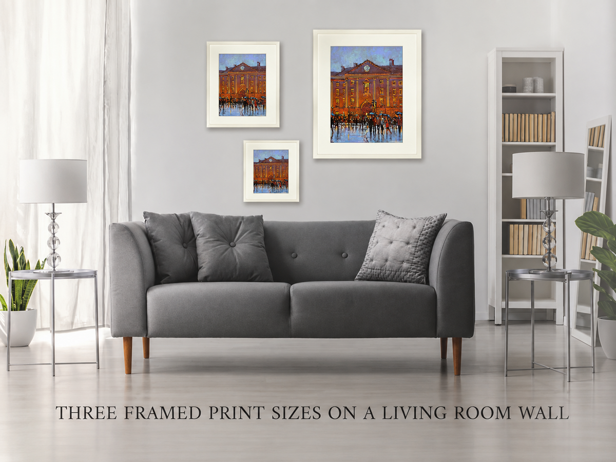 Three framed print sizes of Trinity Rain, Dublin on a living room wall