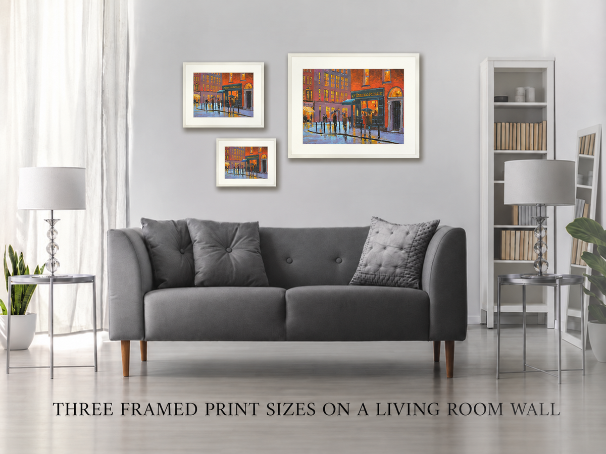 Three framed print sizes of Rainy Evening at the Trocadero, Dublin on a living room wall