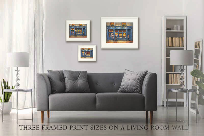 Photo of three versions of the Bottlers pub print on a wall