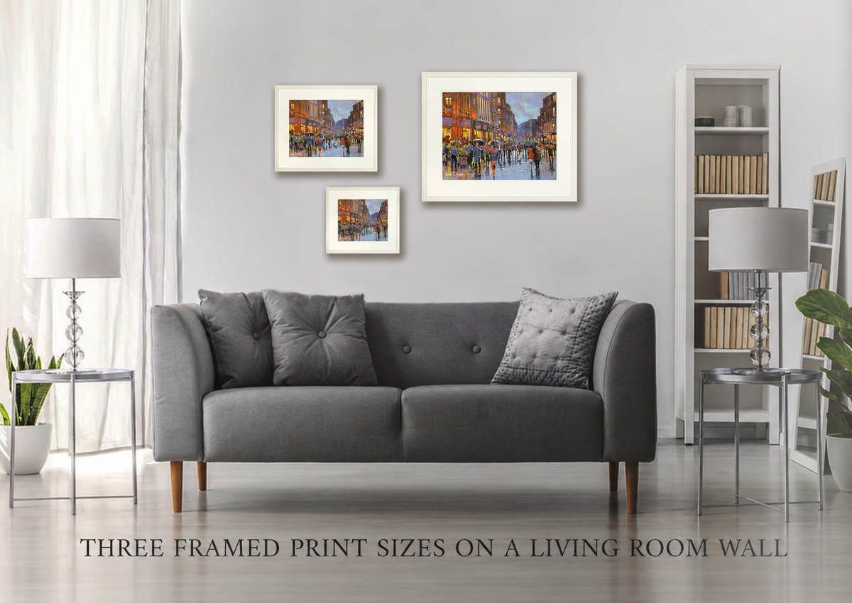 Three framed print sizes of Shopping in the Rain, Grafton Street, Dublin on a living room wall