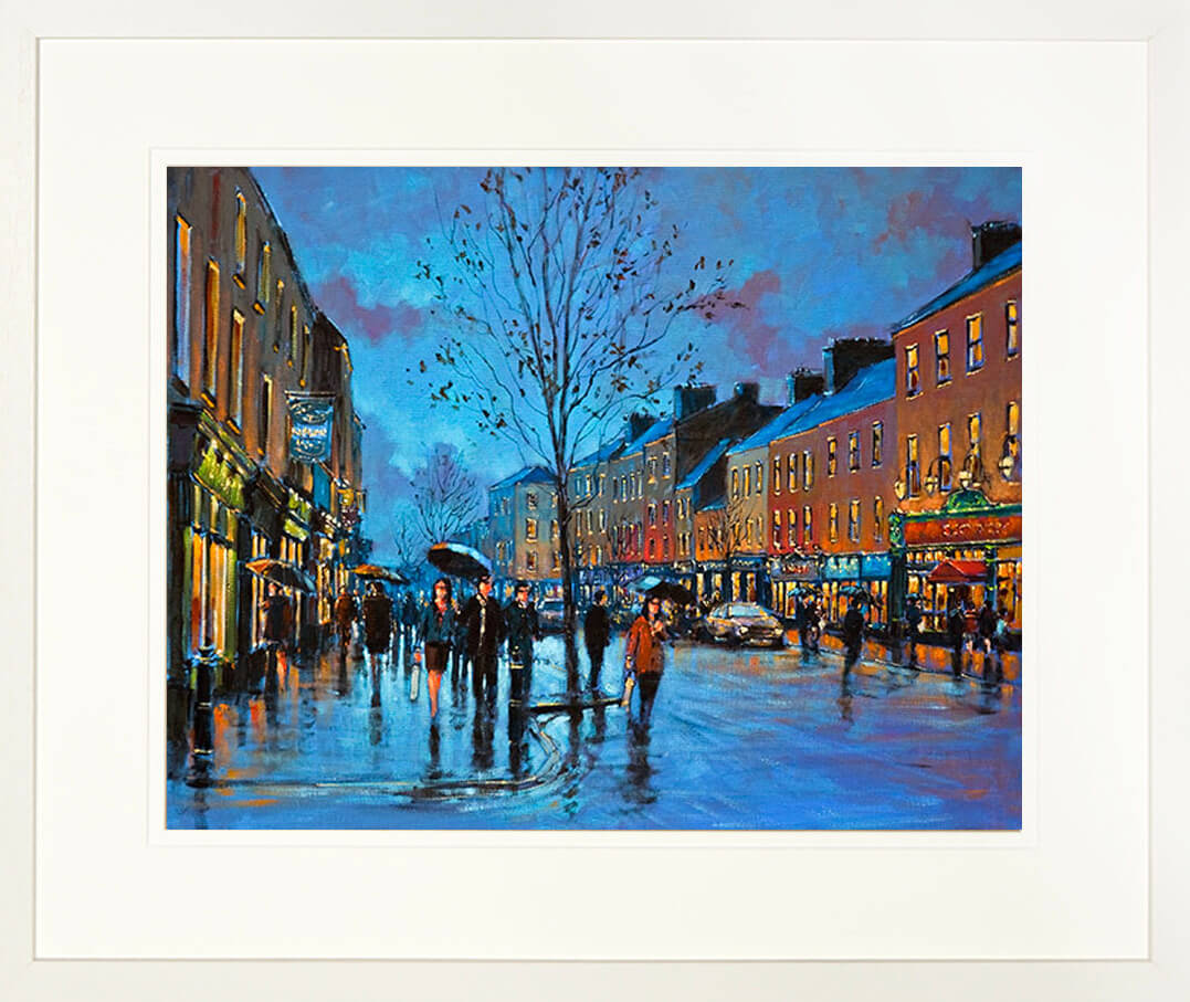A framed print of a painting of the centre of Nenagh A framed print of a painting of the centre of Nenagh Town, County Tipperary, County Tipperary