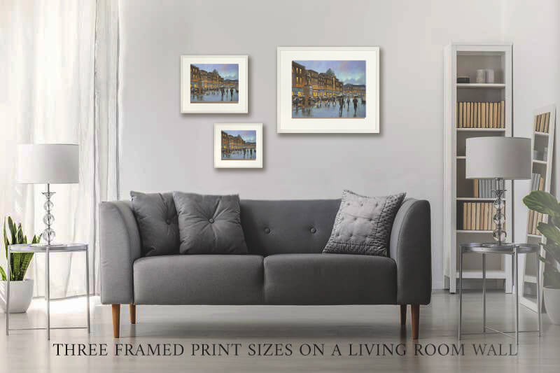 PHOTO OF THE THREE framed PRINT SIZES ON A LIVING ROOM WALL