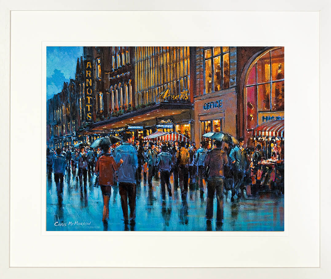 A colourful print of a painting of Henry Street in Dublin city centre framed in a creamy limed frame