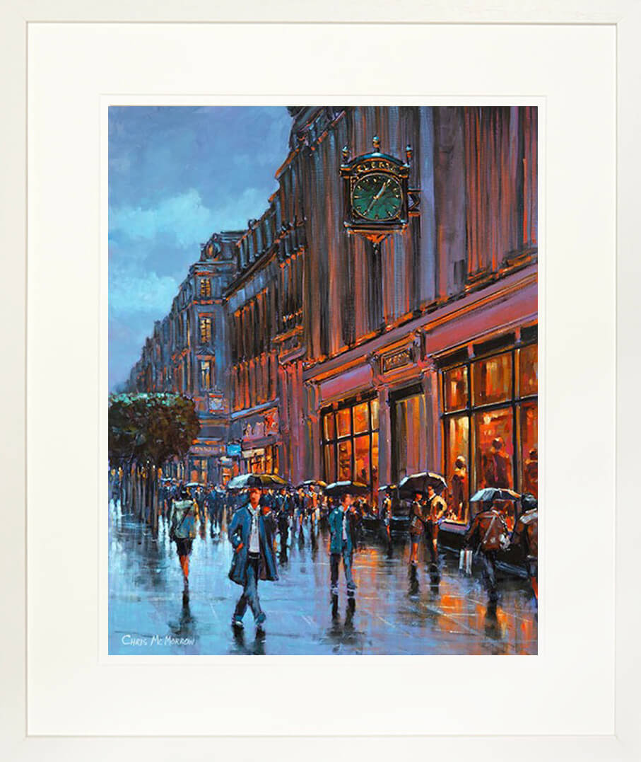 A framed print of a painting of a couple in the distance arm in arm under Clerys Clock on Dublin&#39;s main street