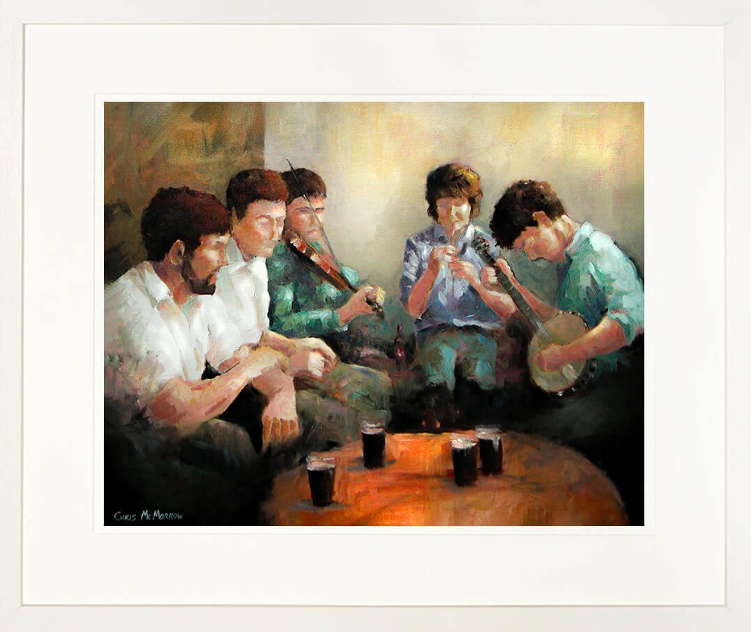 A framed print of a group of traditional Irish musicians in a bar