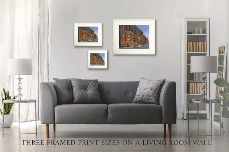 PHOTO OF THE THREE framed PRINT SIZES ON A LIVING ROOM WALL