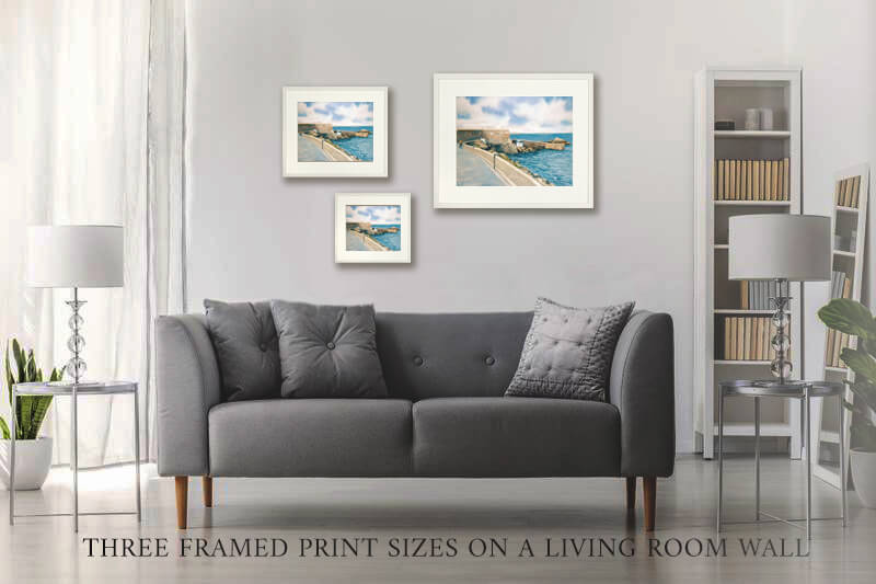 Three framed watercolour prints on a wall