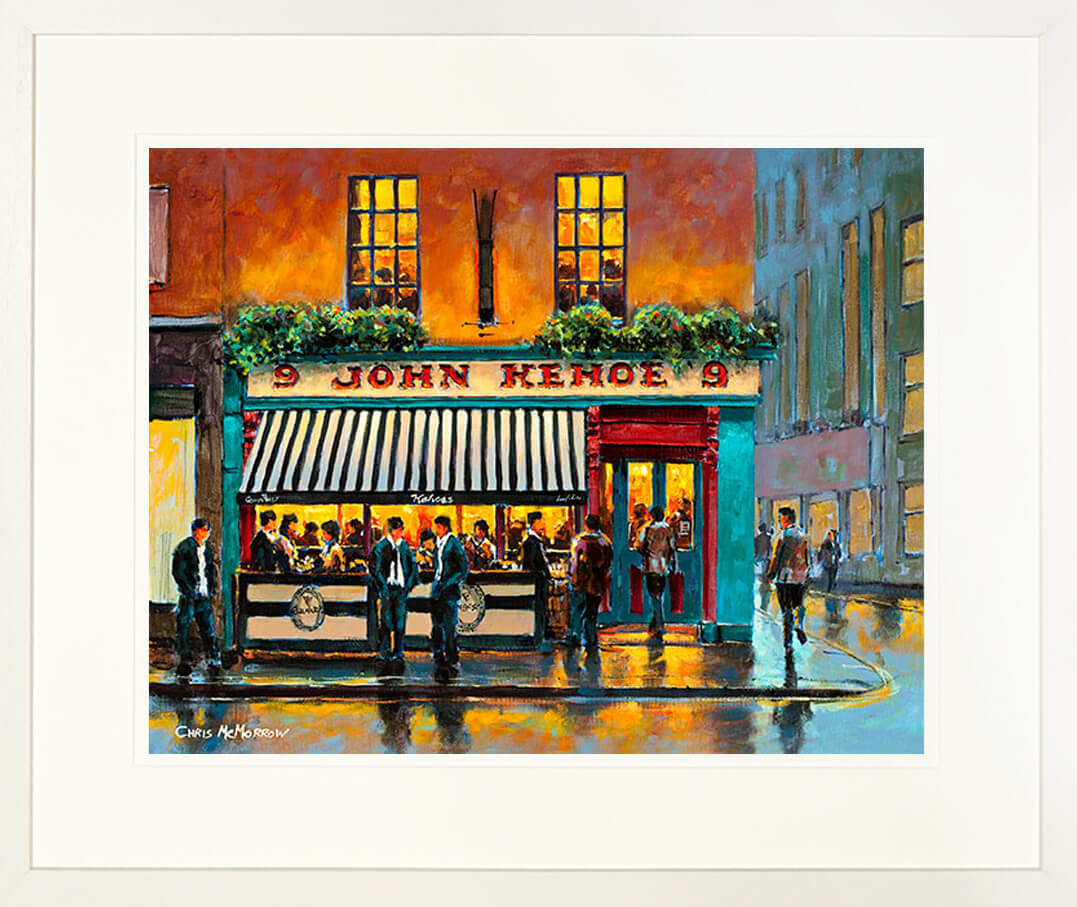A framed print of a painting of the front of Kehoes Bar with a candy striped awning in the early evening
