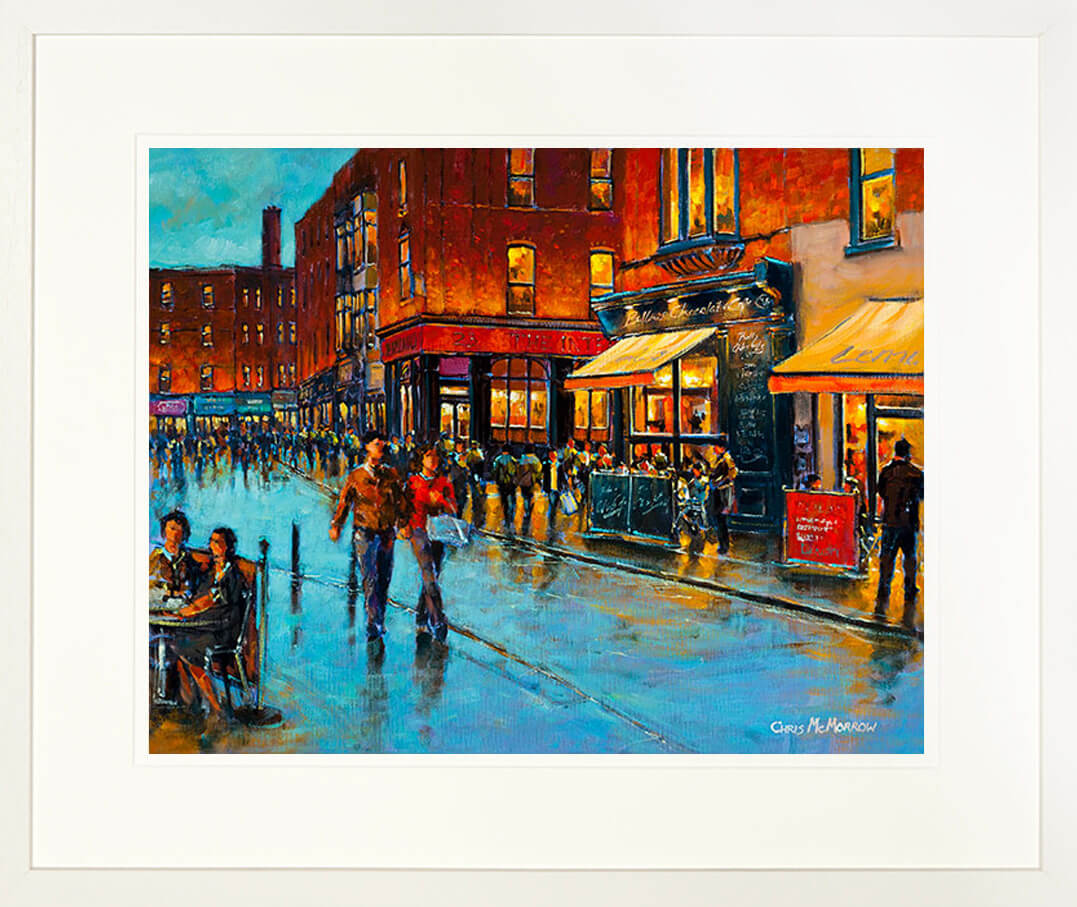 A framed print of a painting of a colourful South william Street in Dublin City centre