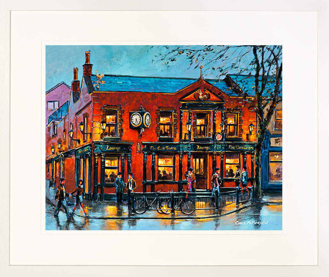 A framed print of a painting of the front façade of the Cock Tavern Pub on the main street in Swords, County Dublin