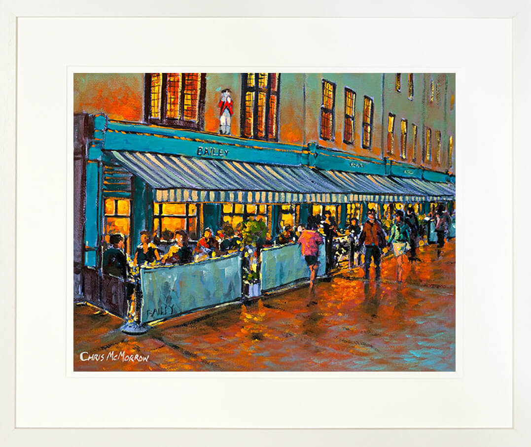 A framed print of a painting of the Bailey Bar with its candy striped awning on Duke Street in the city centre