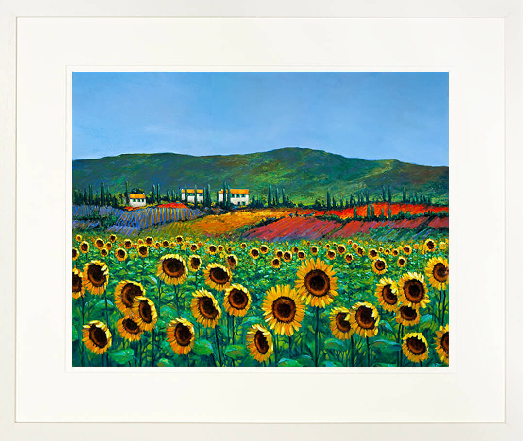 A framed print of the painting Sunflowers mounted in a cream mount