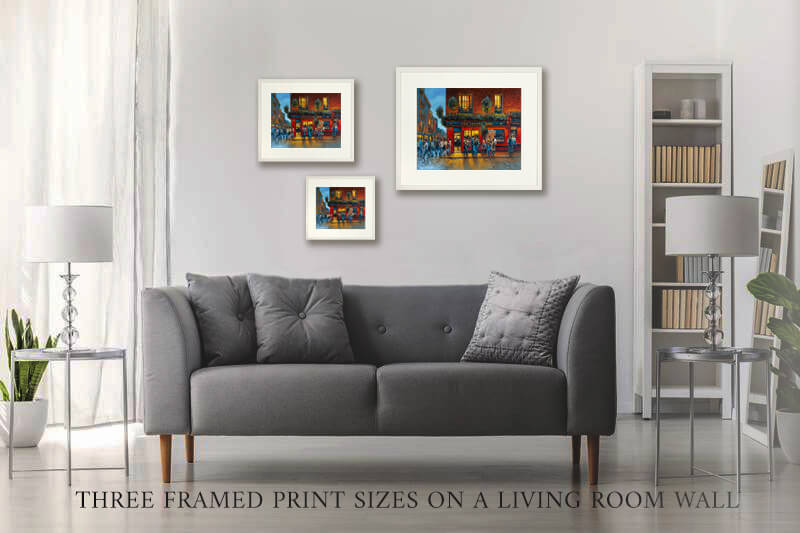 three framed prints of temple bar in dublin on a wall