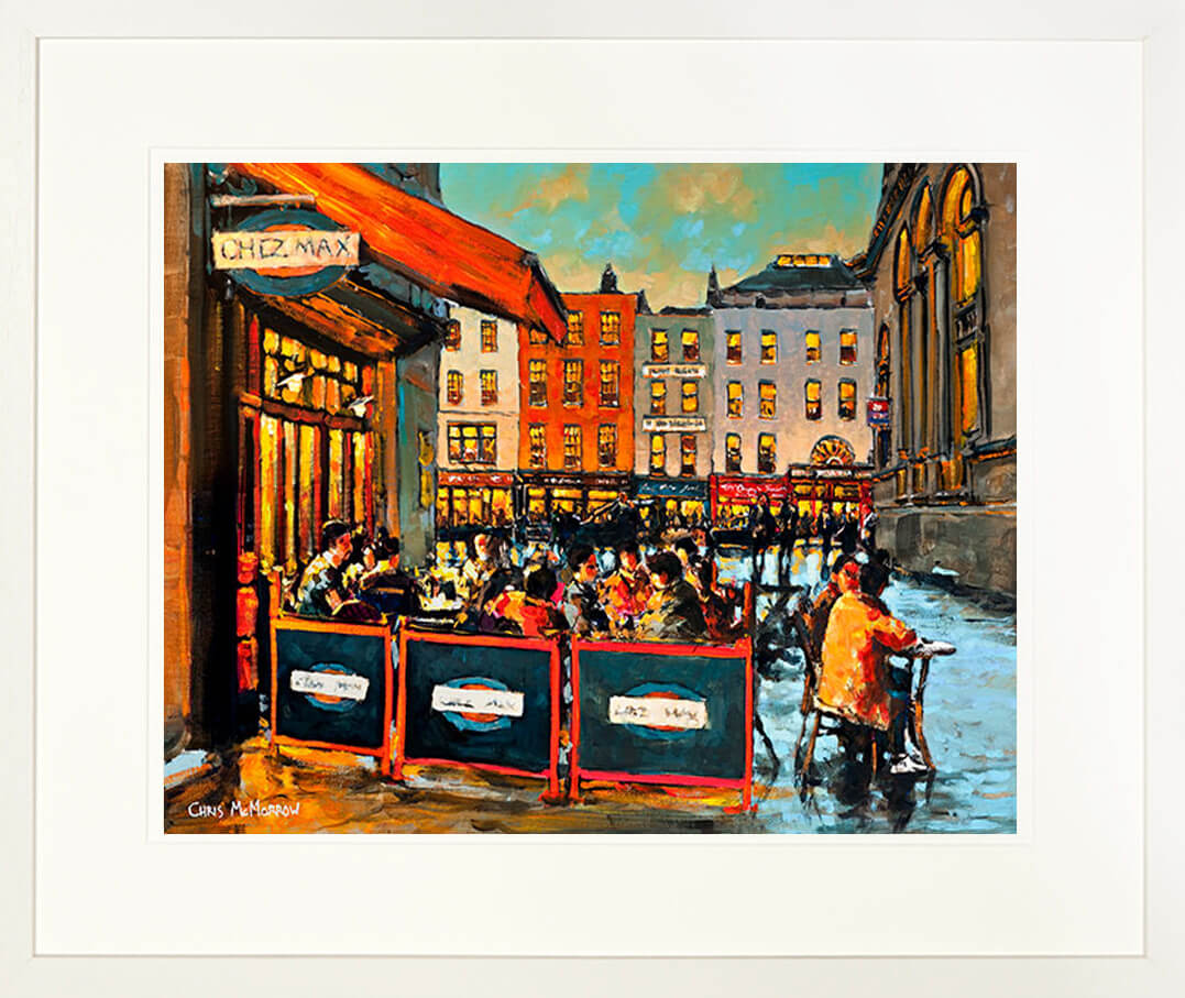 A framed print of a painting showing diners at a Dublin restaurant
