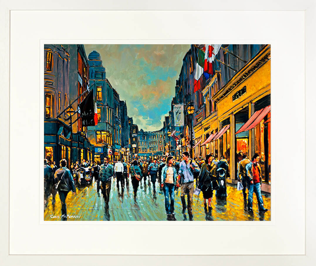 A framed print of a painting of people walking by Brown Thomas Department store on Dublin&#39;s Grafton Street