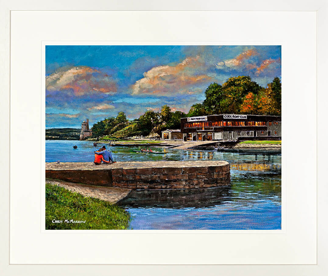 A framed print of a painting of a couple sitting on the dock by the Cork Boat Club
