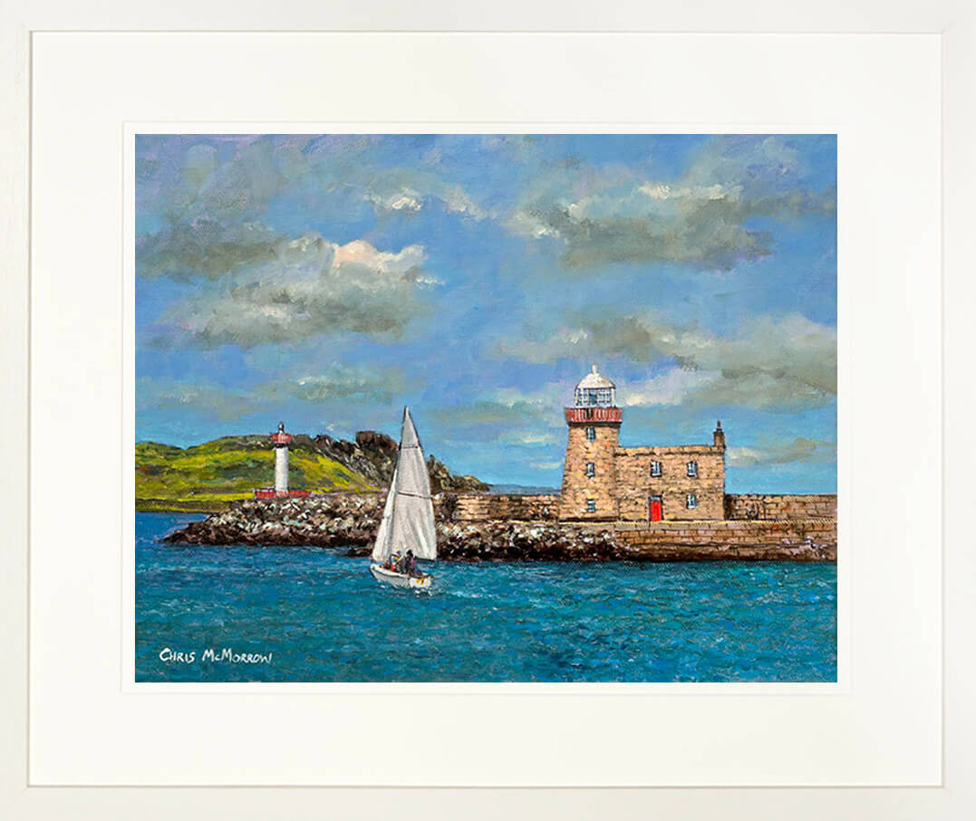 A framed print of a seascape painting of a Howth Harbour and Lighthouse, Co Dublin
