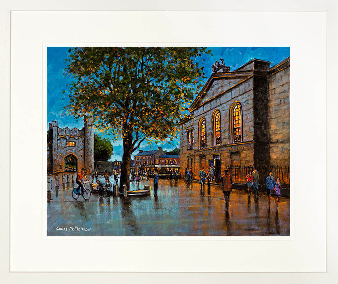 A limited edition print of a painting of Kilmainham Gaol in a cream limed frame