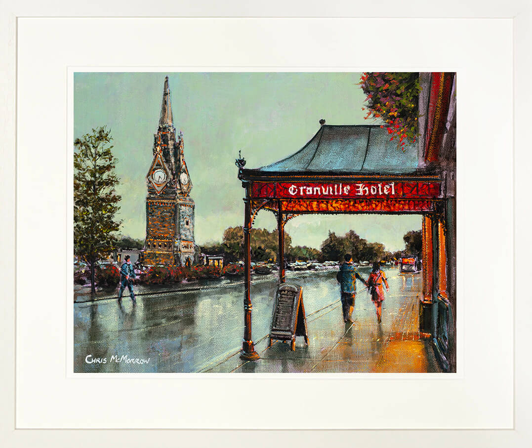 A framed print of a painting of the Clock Tower and Fountain landmark on the quayside of Waterford City