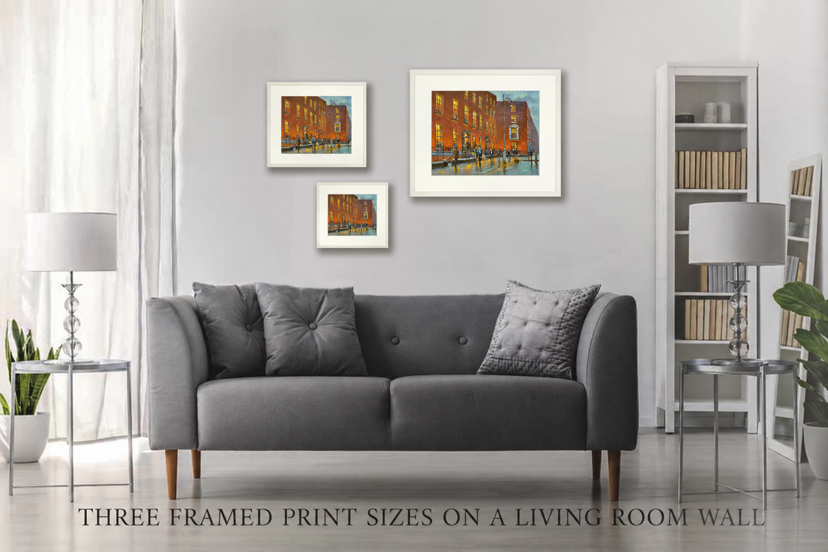 Three framed print sizes of Evening at the Merrion, Dublin on a living room wall