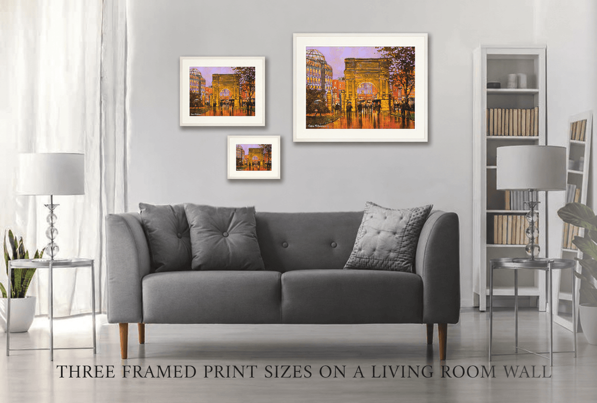 Three framed print sizes of Fusiliers Arch, Stephens Green, Dublin on a living room wall