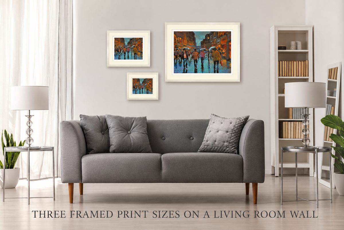 Three framed print sizes of Looking Down Grafton Street, Dublin on a living room wall
