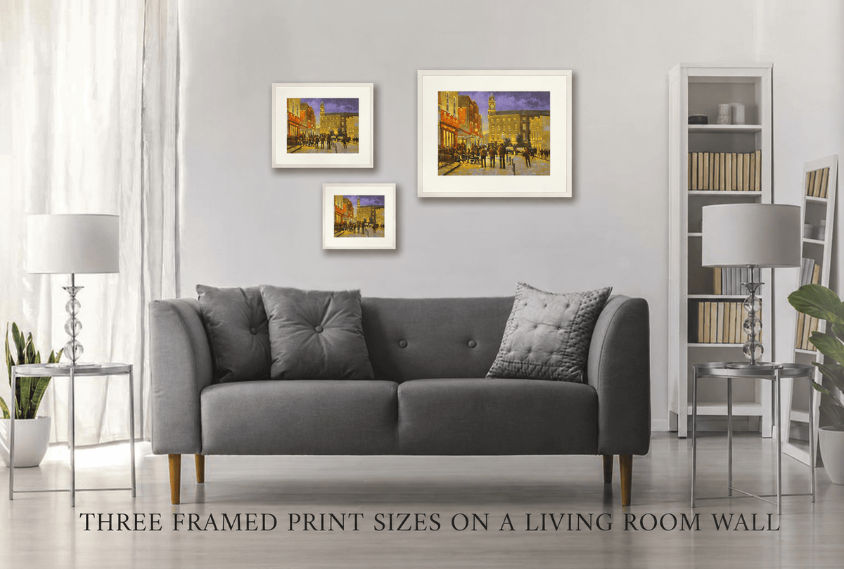 Three framed print sizes of Metro Café, South William Street, Dublin on a living room wall