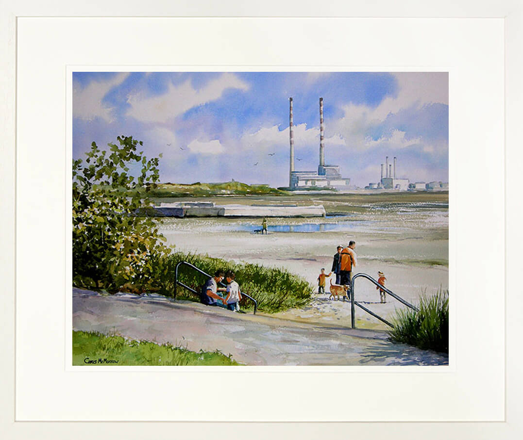 A framed print of a painting of people on the beach at Sandymount, Dublin