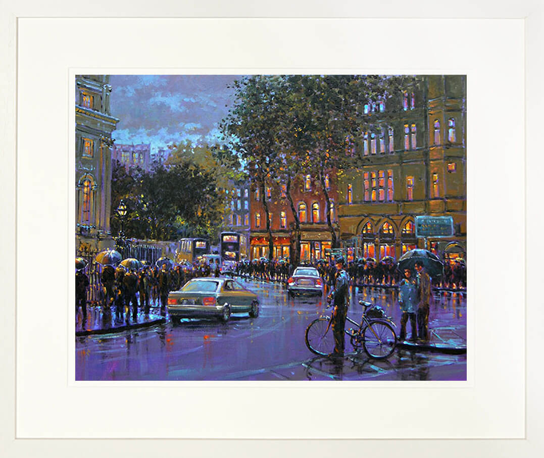 A framed print of a painting of a crowd of pedestrians at the lights in College Green, Dublin