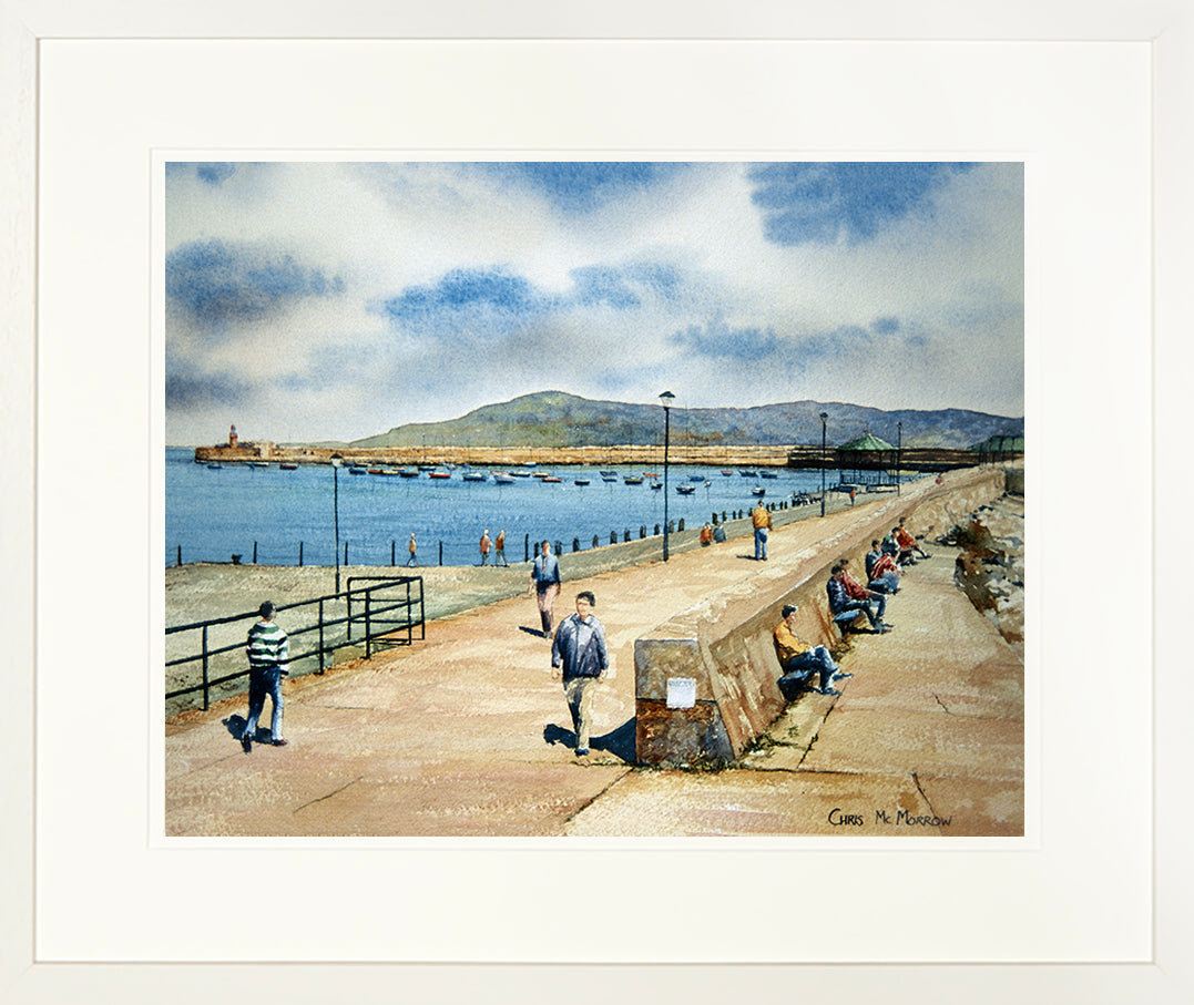 Framed print of strollers and sitters in the sunshine on Dun Laoghaire pier